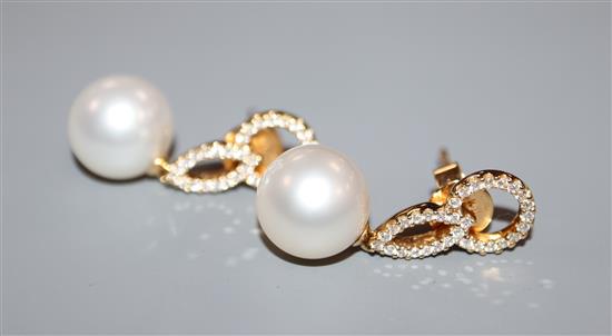 A pair of 18ct yellow gold, pearl and grain-set diamond drop earrings, 26mm.